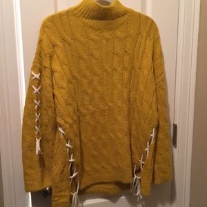 Super soft sweater with lacing on sides & sleeves